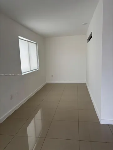 a kitchen with sink and faucet