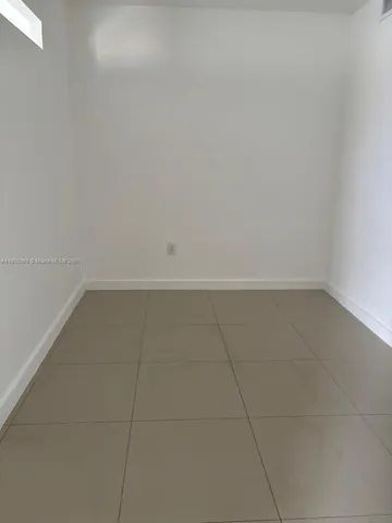 a kitchen with stainless steel appliances granite countertop a sink and a stove