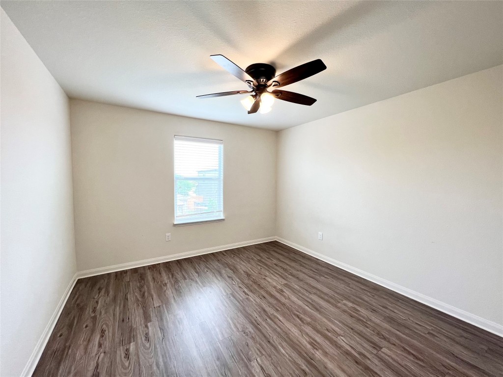 108 Major Lee Lane Jarrell, TX 76537 - Photo 13 of 15 wooden floor in an empty room with a window
