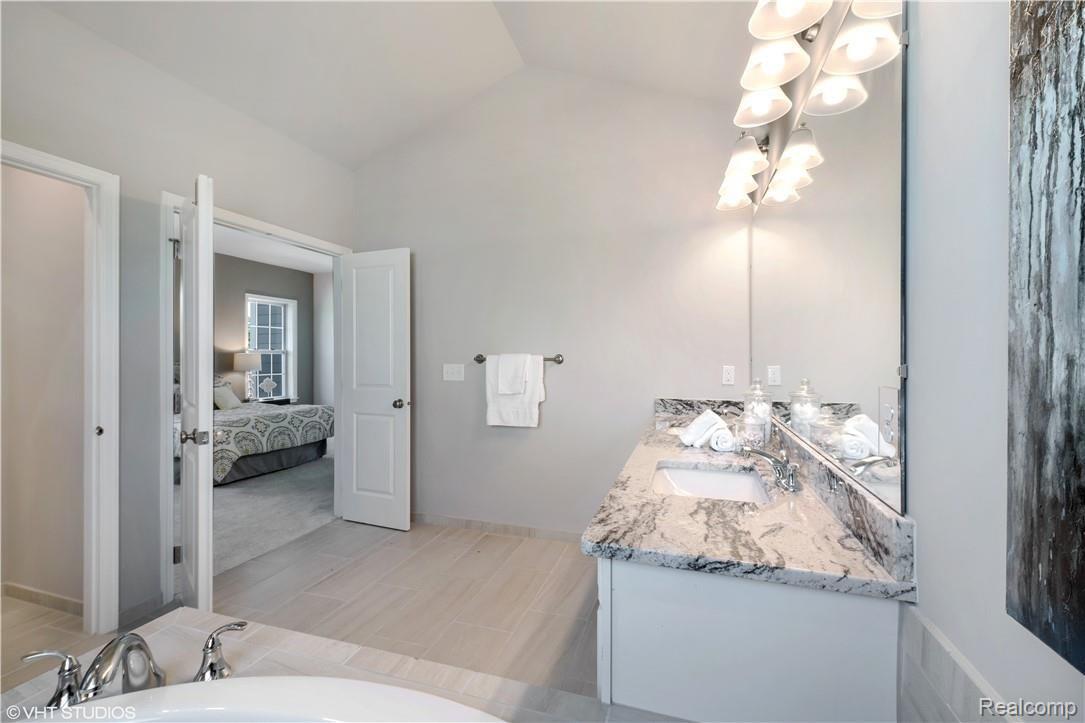 51018 Rockingham Drive Canton, MI 48188 - Photo 10 of 11 08_50850ScarboroughRoad_13_MasterBathroom_HiRes.jpg