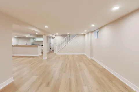 a view of a room with a wooden floor