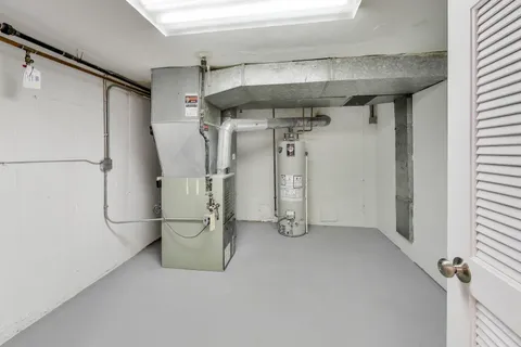 a view of a storage & utility room with washer and dryer
