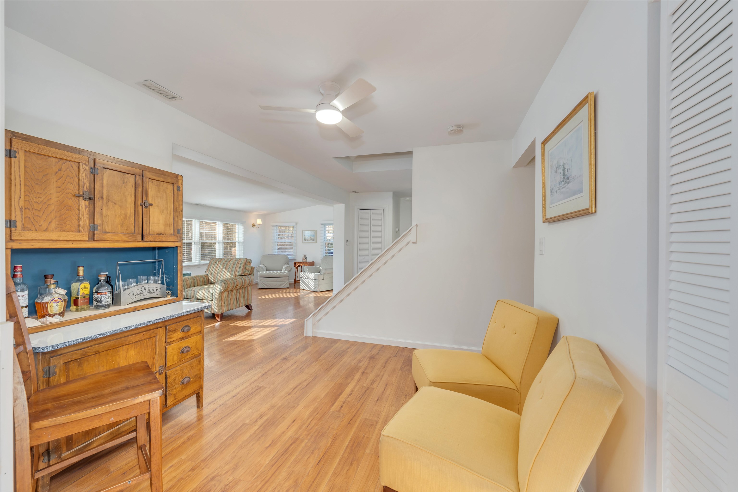 220 Iselin Road Cape May, NJ 08204 - Photo 15 of 43 a living room with furniture and a wooden floor
