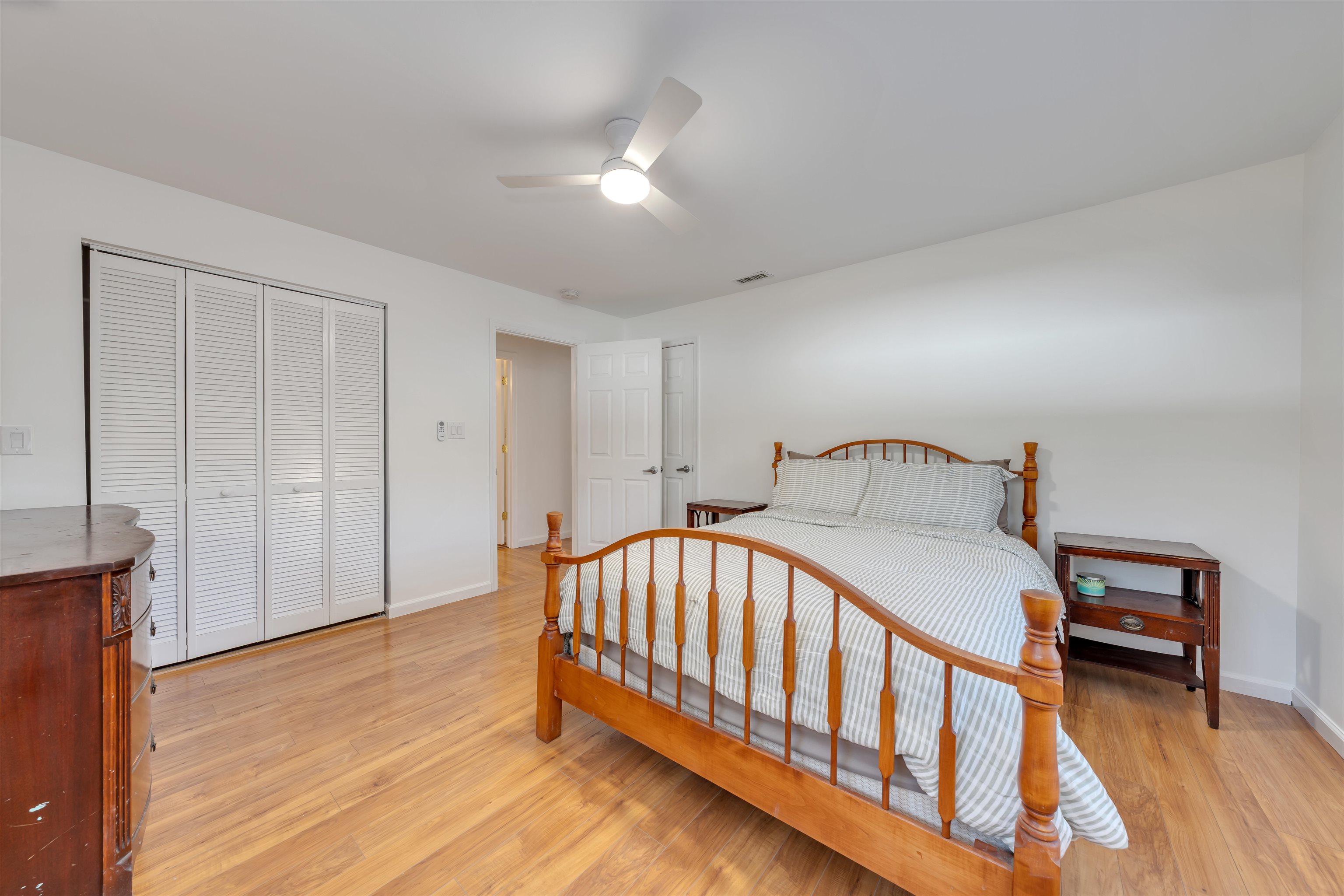 220 Iselin Road Cape May, NJ 08204 - Photo 25 of 43 a bedroom with furniture and a window