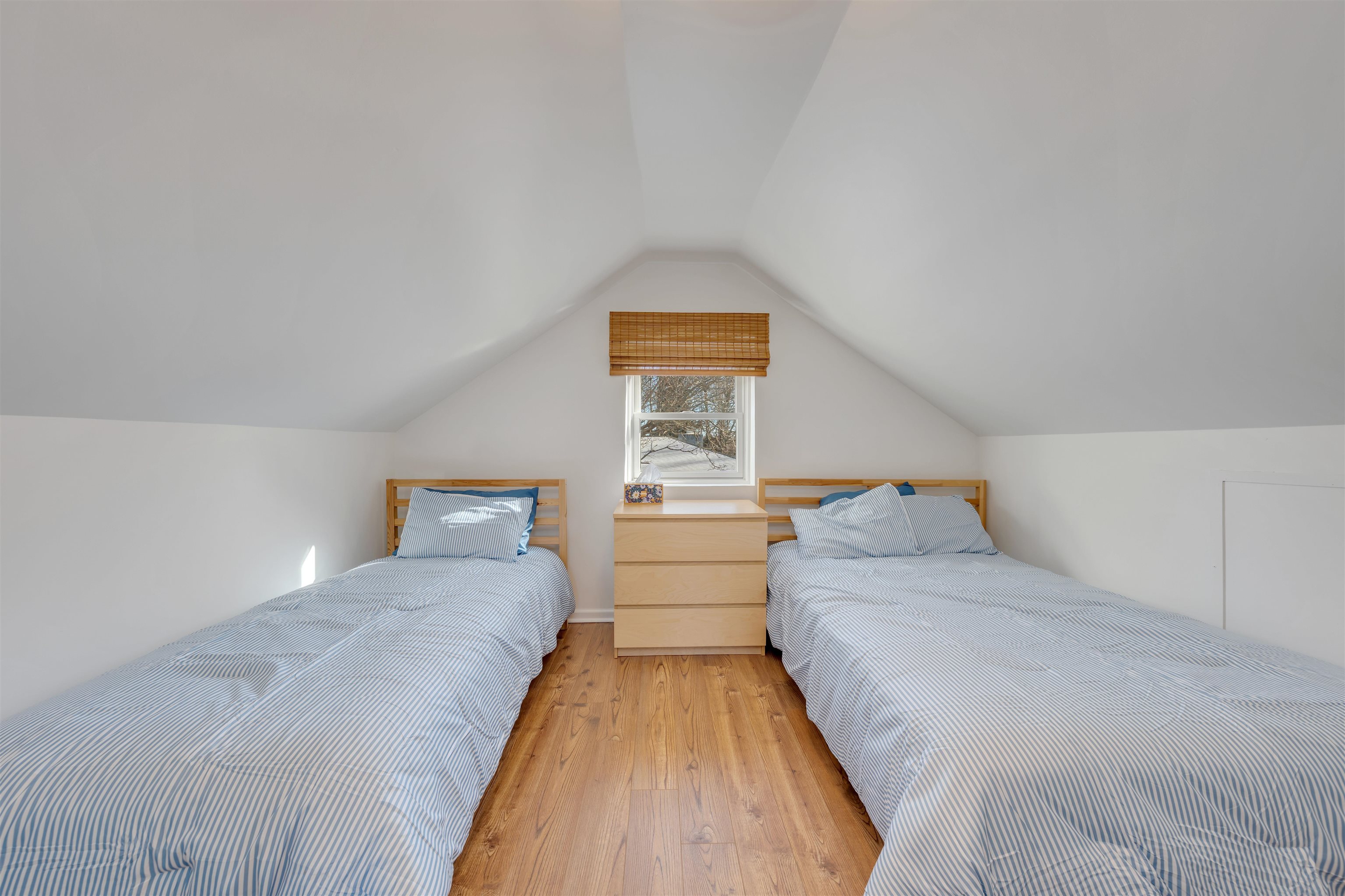 220 Iselin Road Cape May, NJ 08204 - Photo 30 of 43 a bedroom with a bed and a window