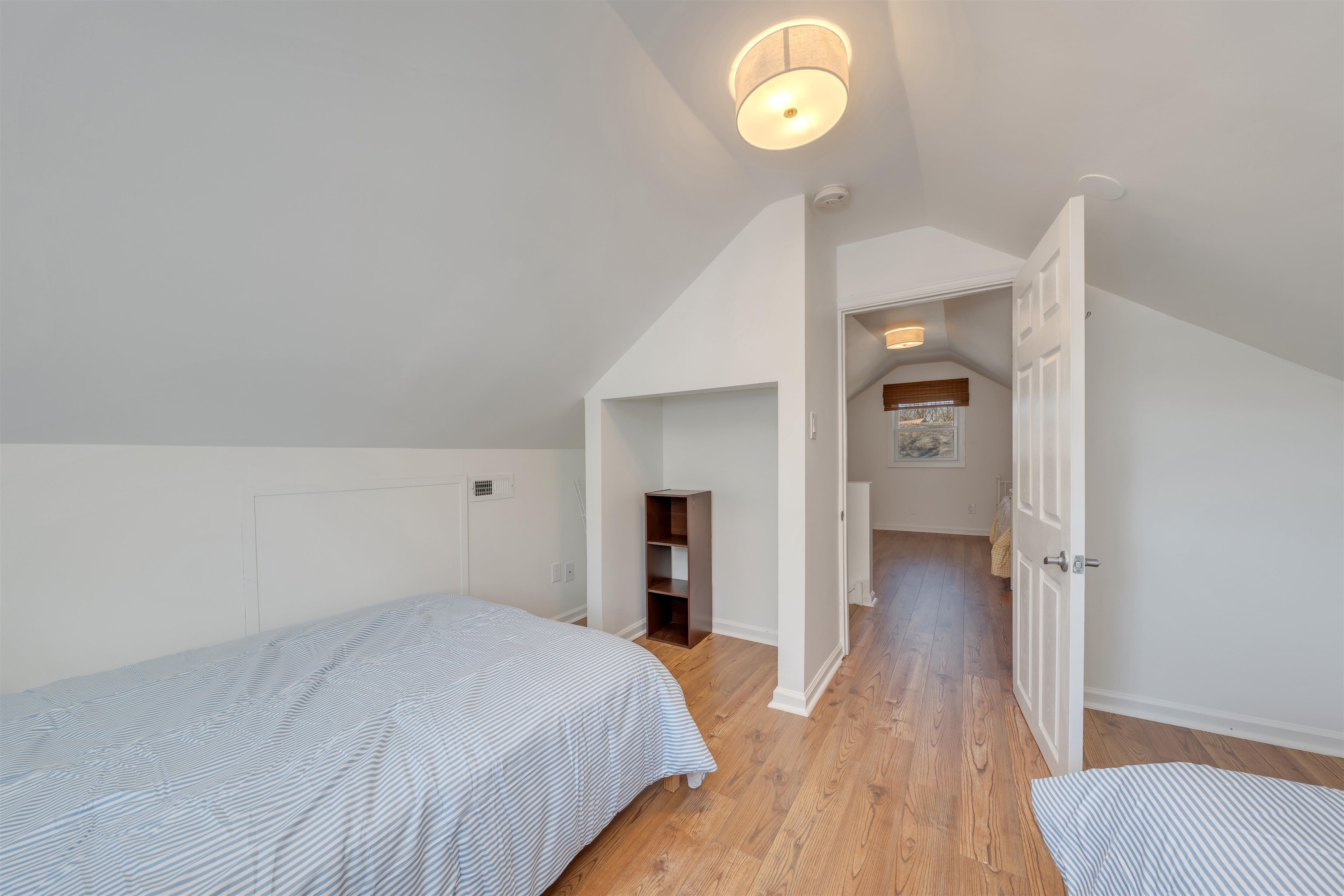 220 Iselin Road Cape May, NJ 08204 - Photo 31 of 43 a bedroom with a bed and a window