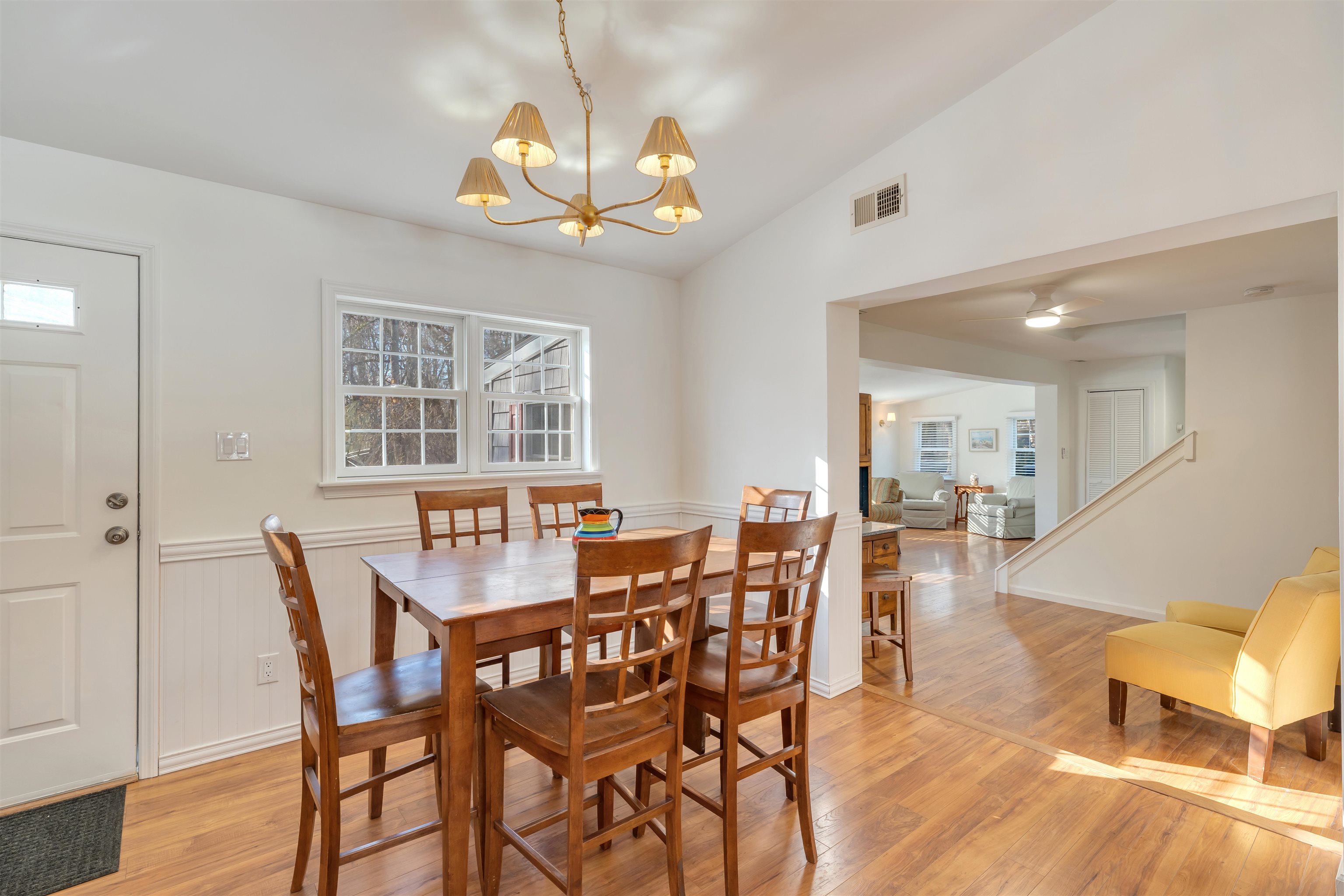 220 Iselin Road Cape May, NJ 08204 - Photo 5 of 43 a view of a dining room with furniture wooden floor and chandelier