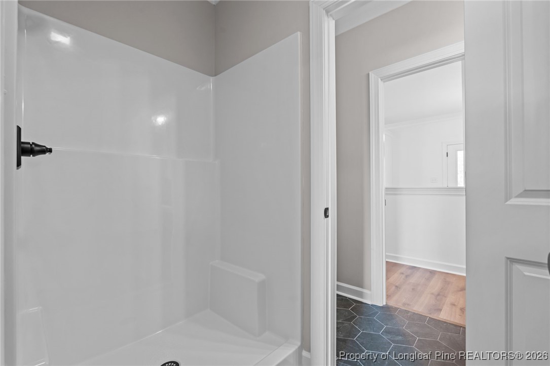 296 Persimmon Tree Drive Cameron, NC 28326 - Photo 17 of 43 a bathroom with a shower