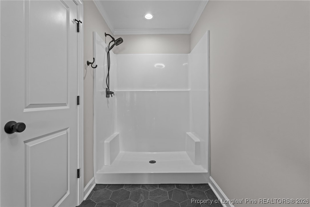 296 Persimmon Tree Drive Cameron, NC 28326 - Photo 22 of 43 a bathroom with a shower
