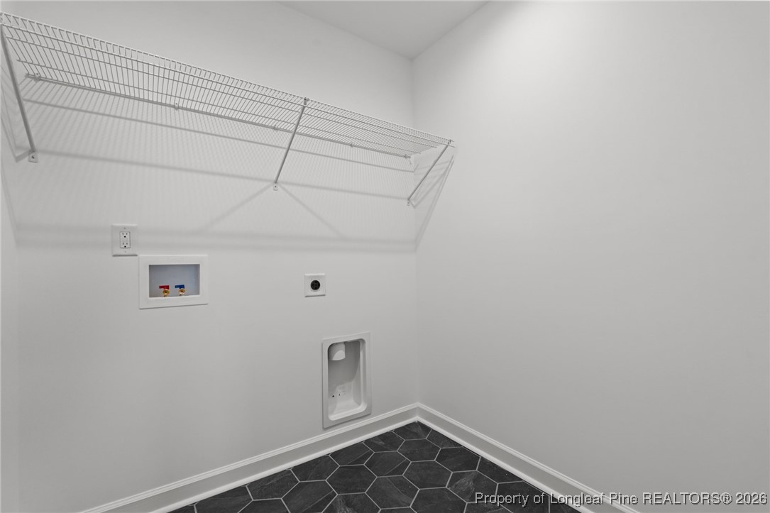 296 Persimmon Tree Drive Cameron, NC 28326 - Photo 27 of 43 a view of utility room