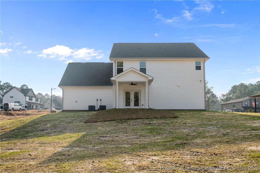 296 Persimmon Tree Drive Cameron, NC 28326 - Photo 33 of 43 a front view of a house with a yard
