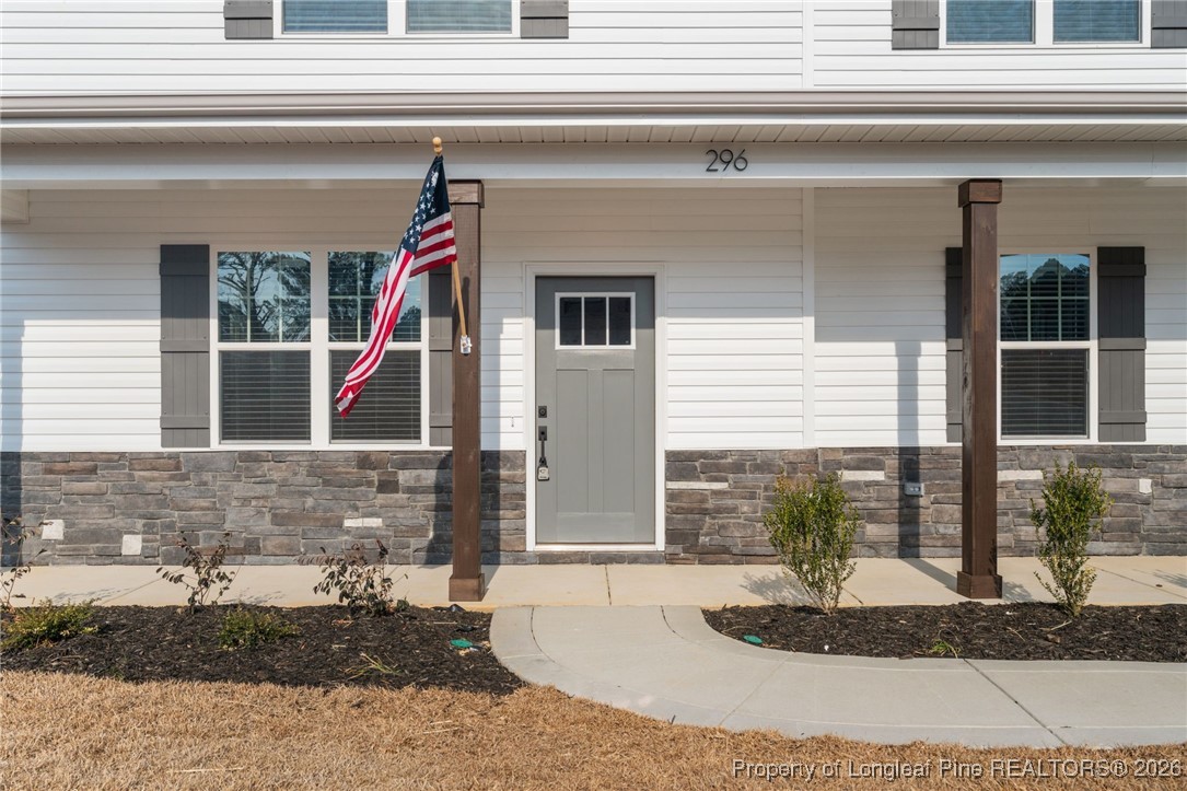 296 Persimmon Tree Drive Cameron, NC 28326 - Photo 40 of 43 a view of house and front door