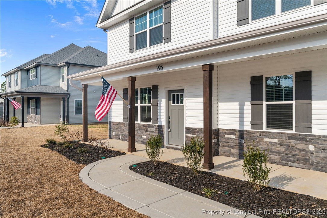 296 Persimmon Tree Drive Cameron, NC 28326 - Photo 41 of 43 a front view of a house with sitting area