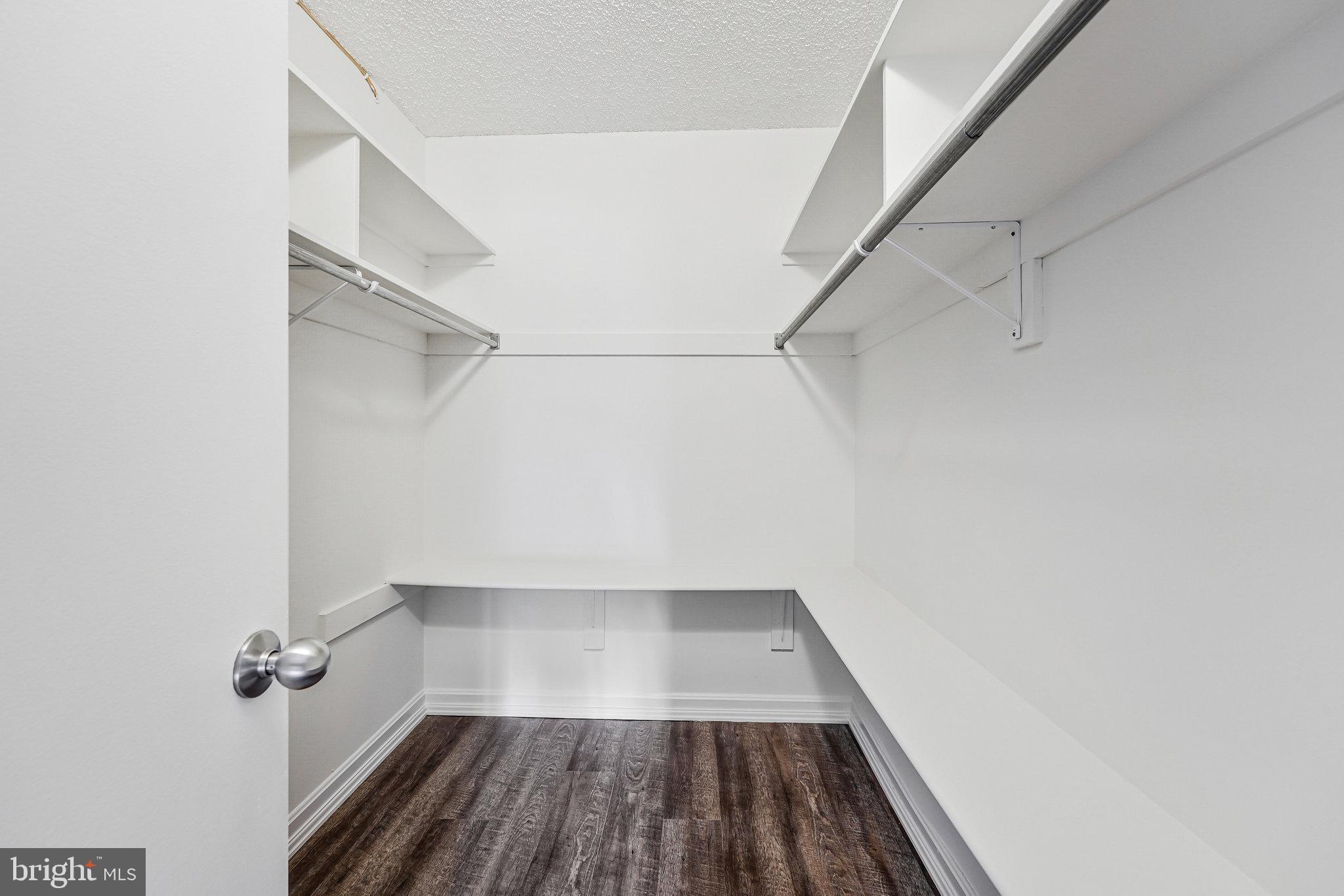 1800 Old Meadow Road, Unit 302 McLean, VA 22102 - Photo 19 of 35 a view of a room with racks on the wall