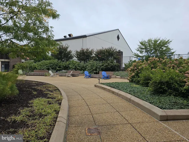 a view of a sitting area with furniture and garden