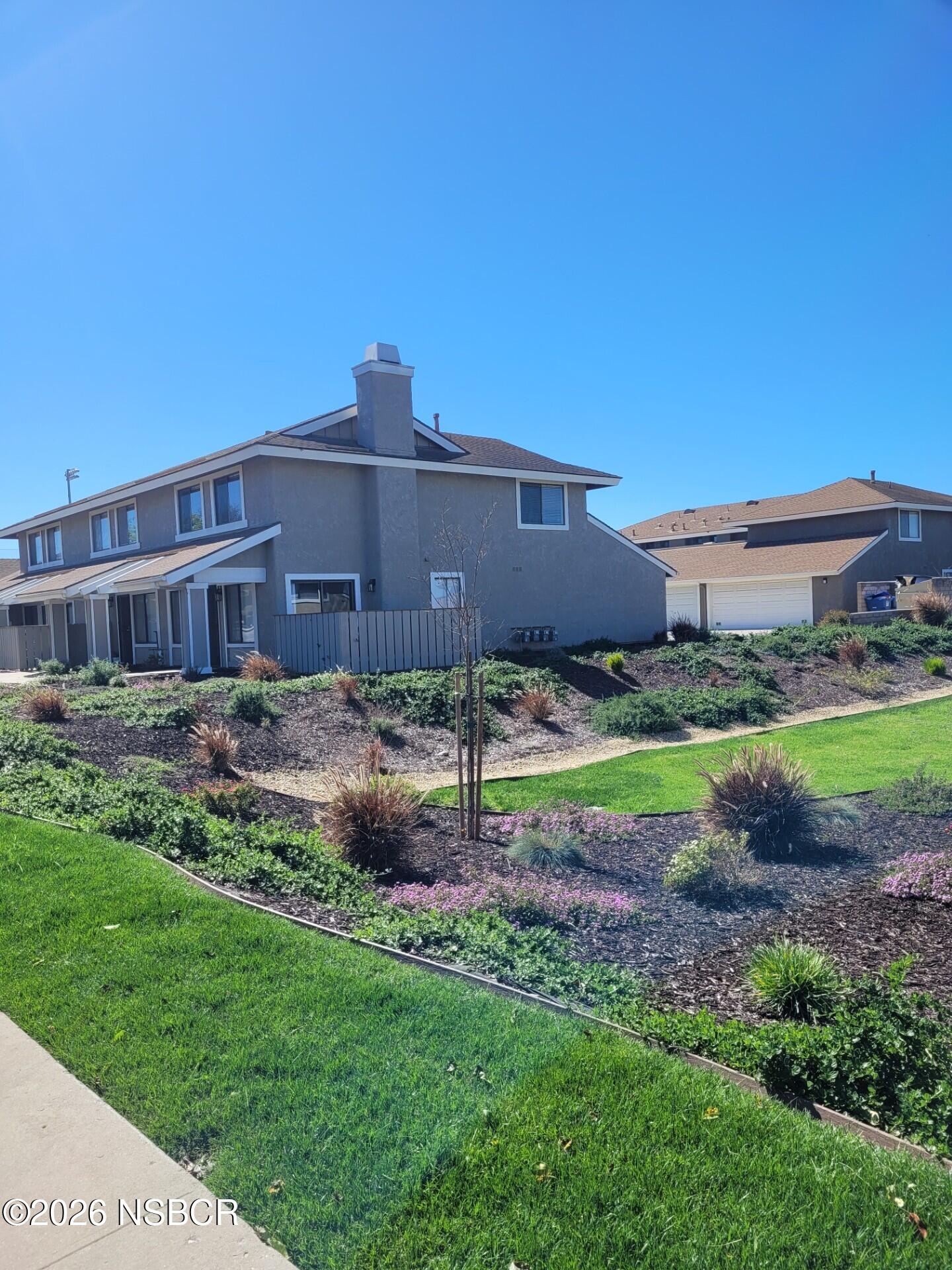 1193 East Foster Road, Unit D Santa Maria, CA 93455 - Photo 21 of 24 a house view with a garden space