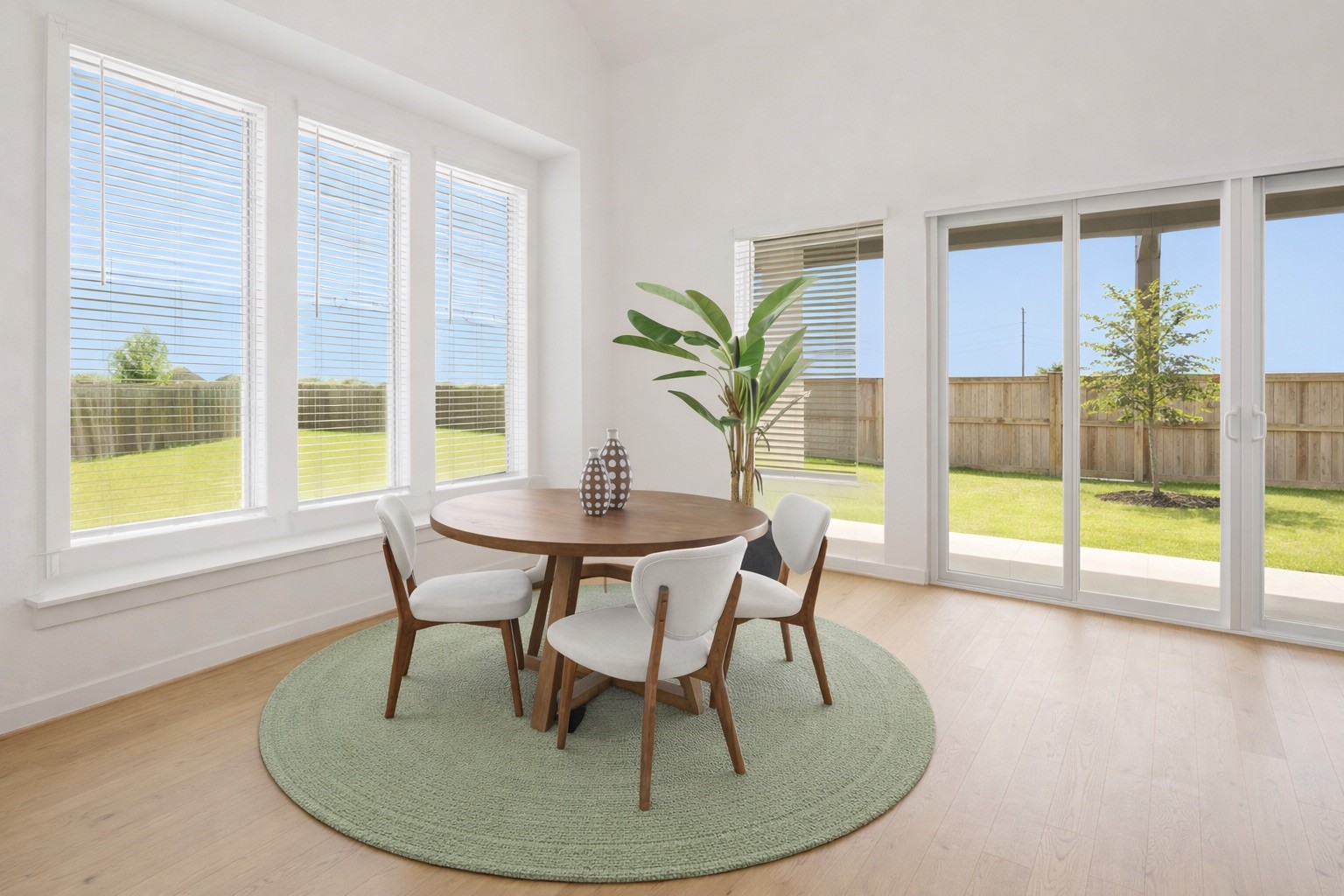 7303 Compass Drive Katy, TX 77493 - Photo 11 of 31 a dining room with furniture and wooden floor