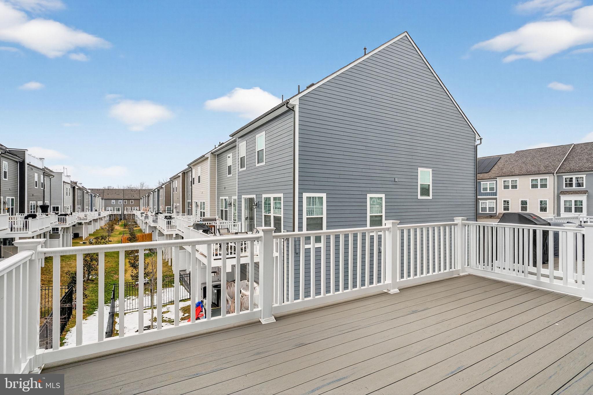 18245 Moss Garden Road Dumfries, VA 22026 - Photo 14 of 71 a view of a balcony with city view