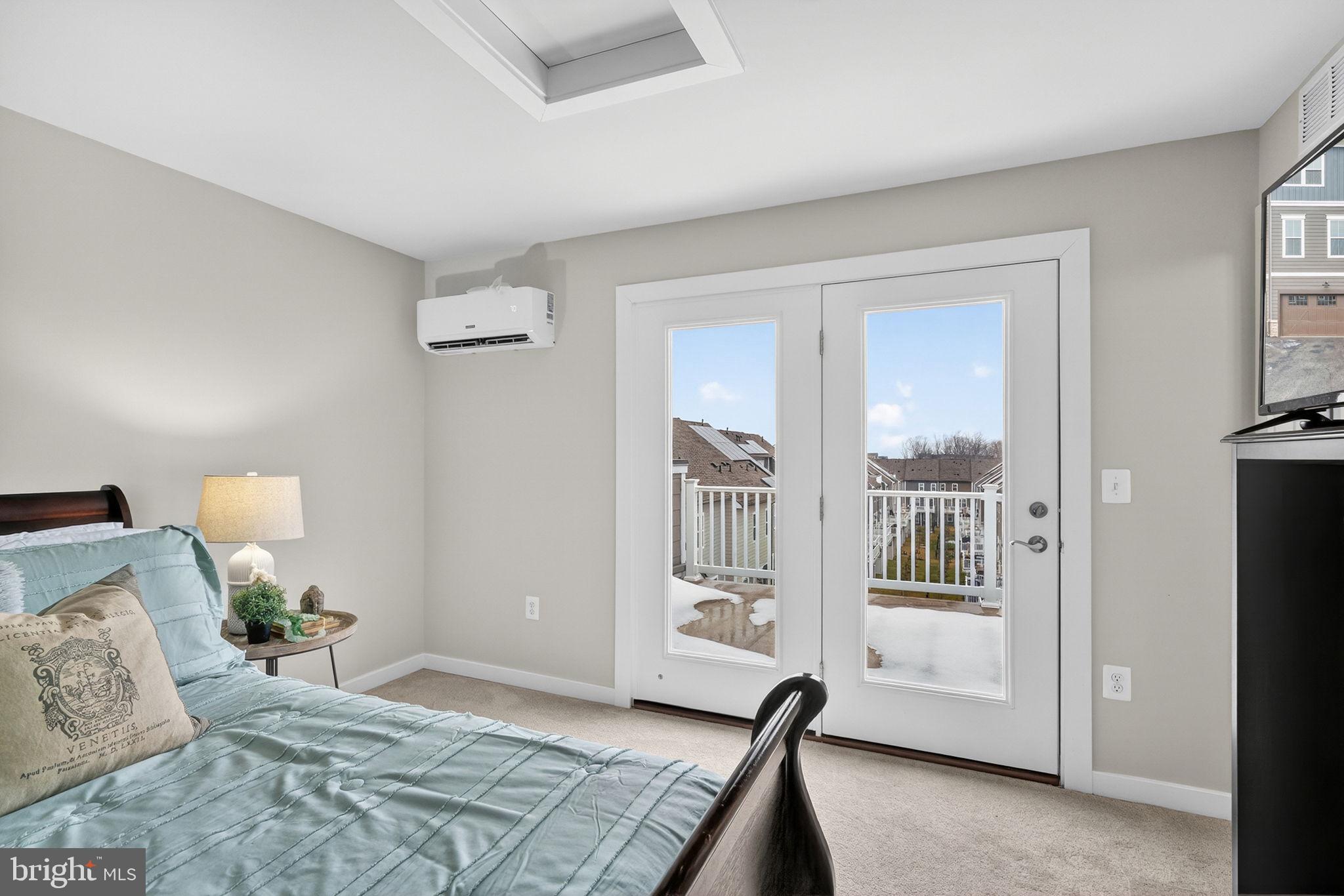 18245 Moss Garden Road Dumfries, VA 22026 - Photo 27 of 71 a bedroom with furniture and wooden floor