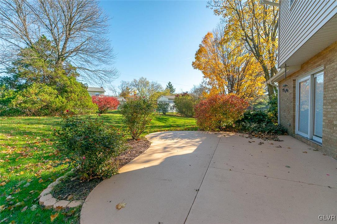 1130 Stark Road Bethlehem, PA 18017 - Photo 21 of 25 Backyard patio with sliders to family room
