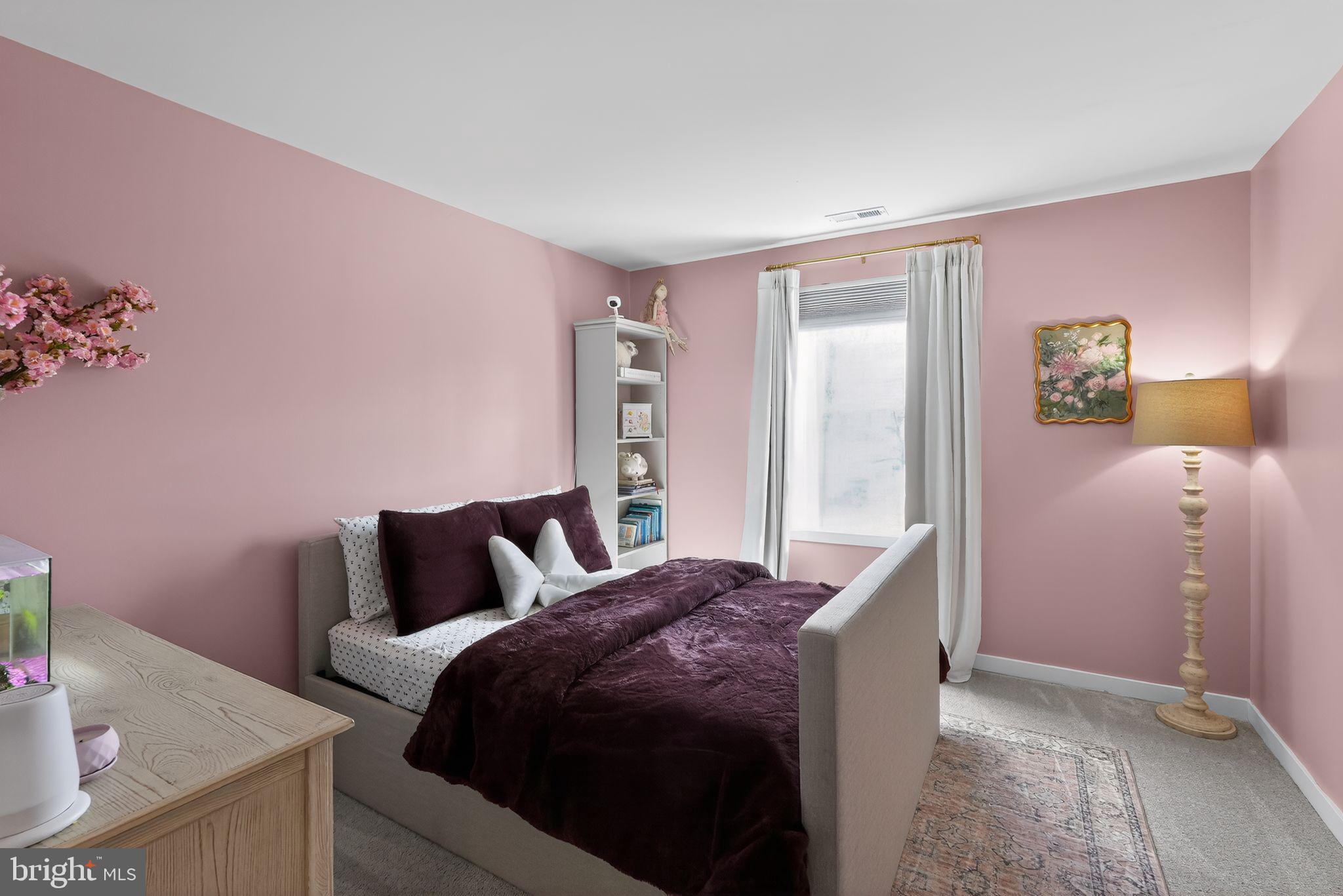 1017 Mariwill Drive Quakertown, PA 18951 - Photo 23 of 31 a bedroom with a bed and wooden floor