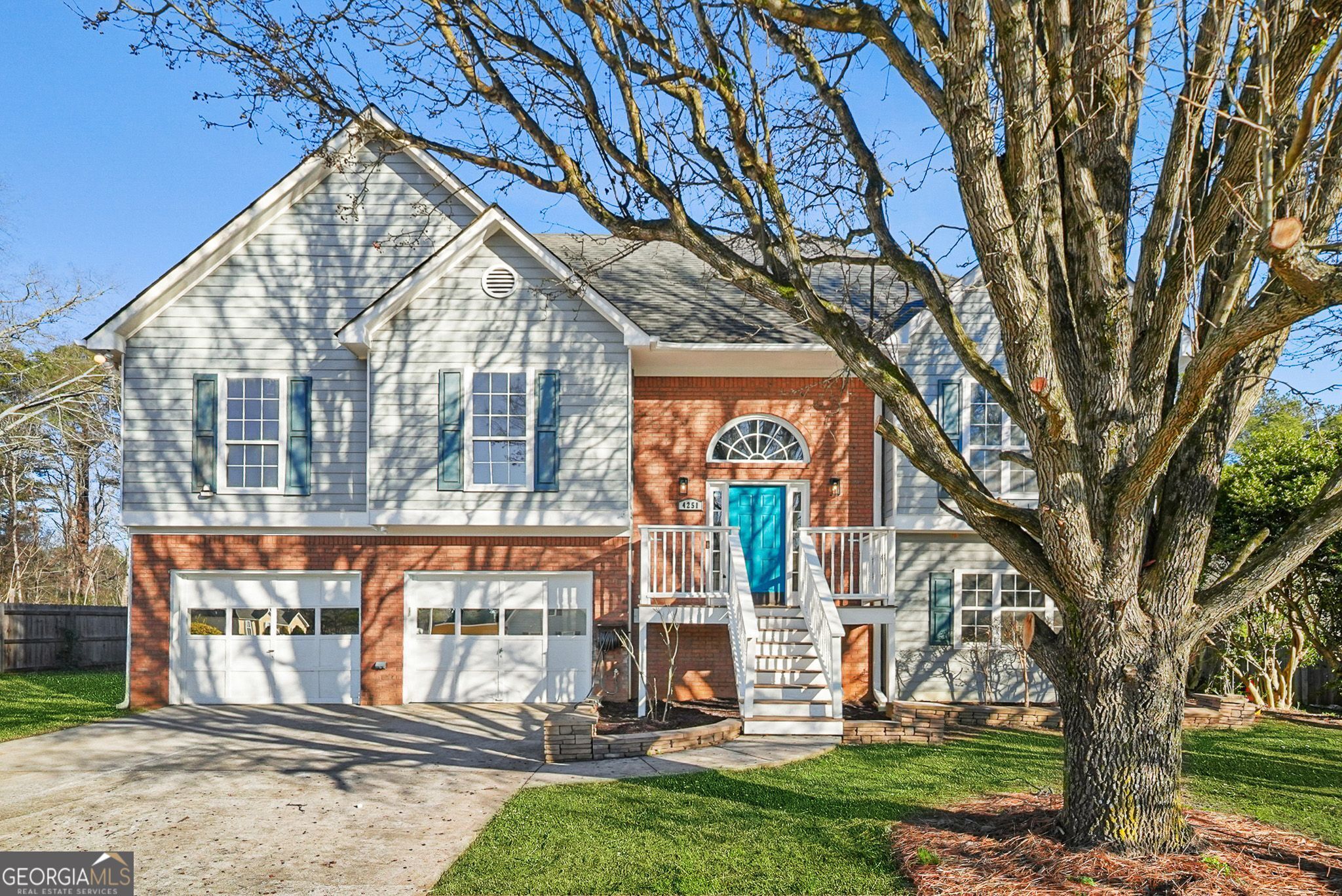 front view of a house with a yard