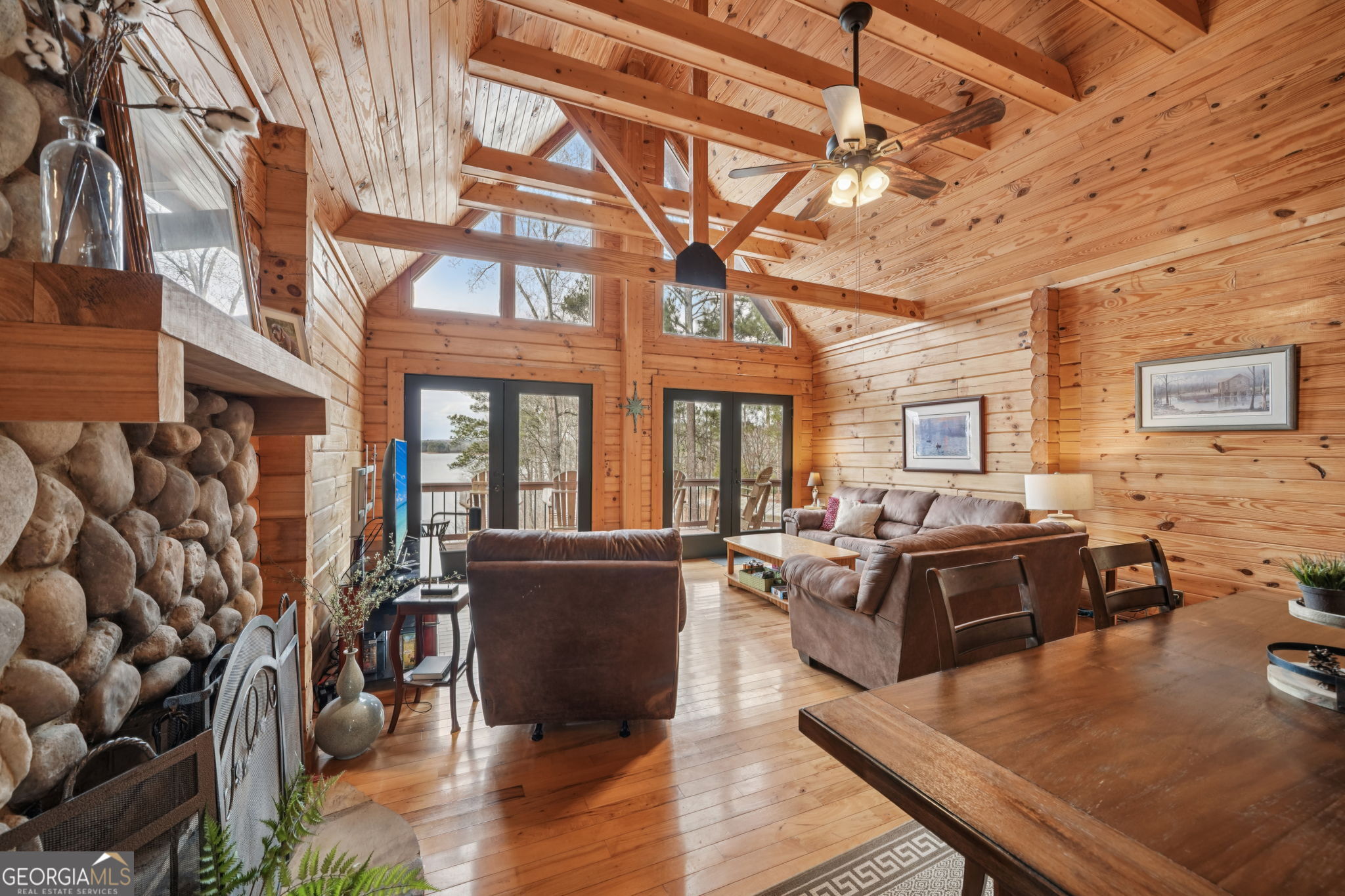 50 Eubanks Point Road Wedowee, AL 36278 - Photo 11 of 81 a living room with furniture a couch and large window