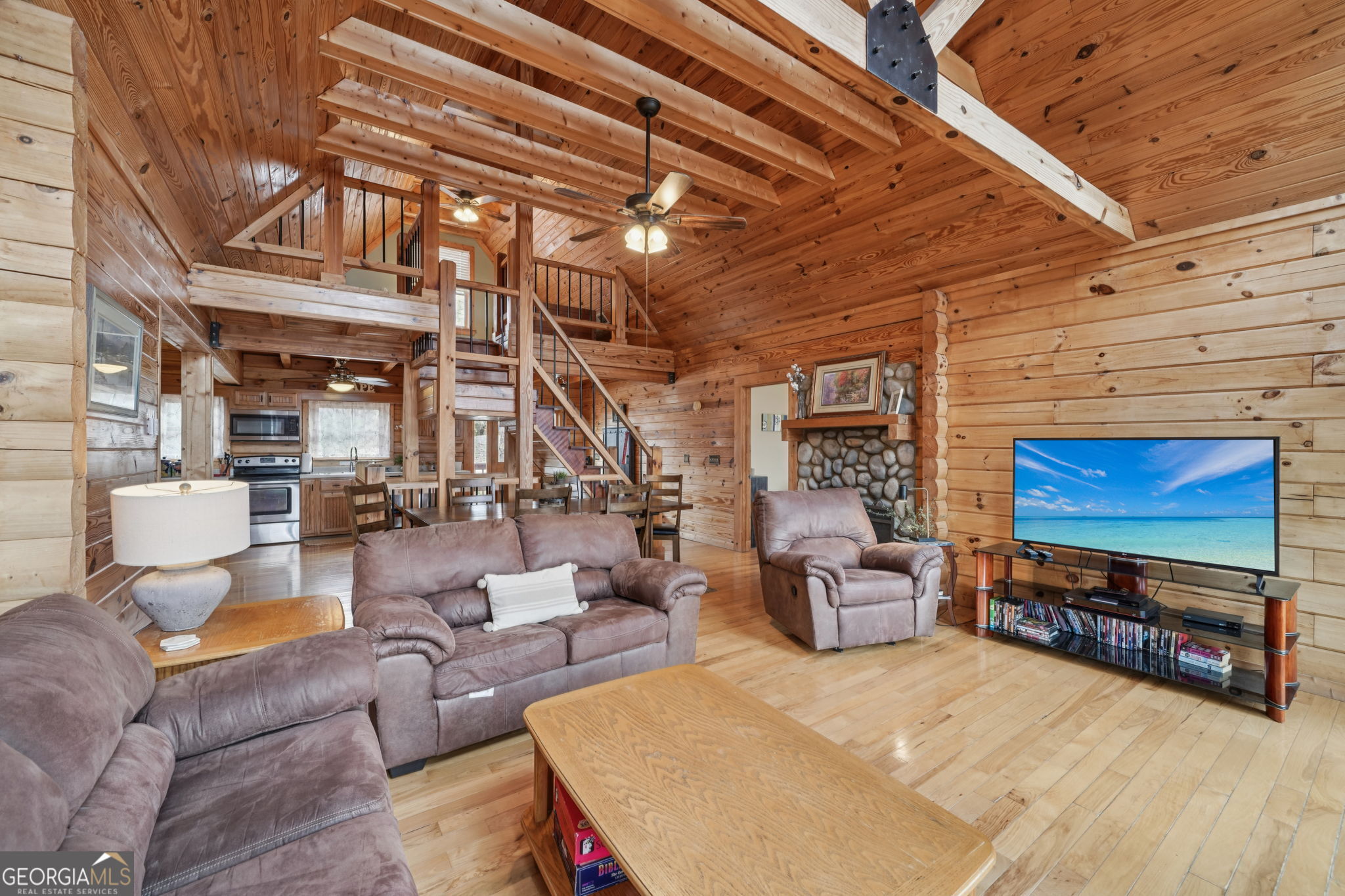 50 Eubanks Point Road Wedowee, AL 36278 - Photo 15 of 81 a living room with furniture and a flat screen tv