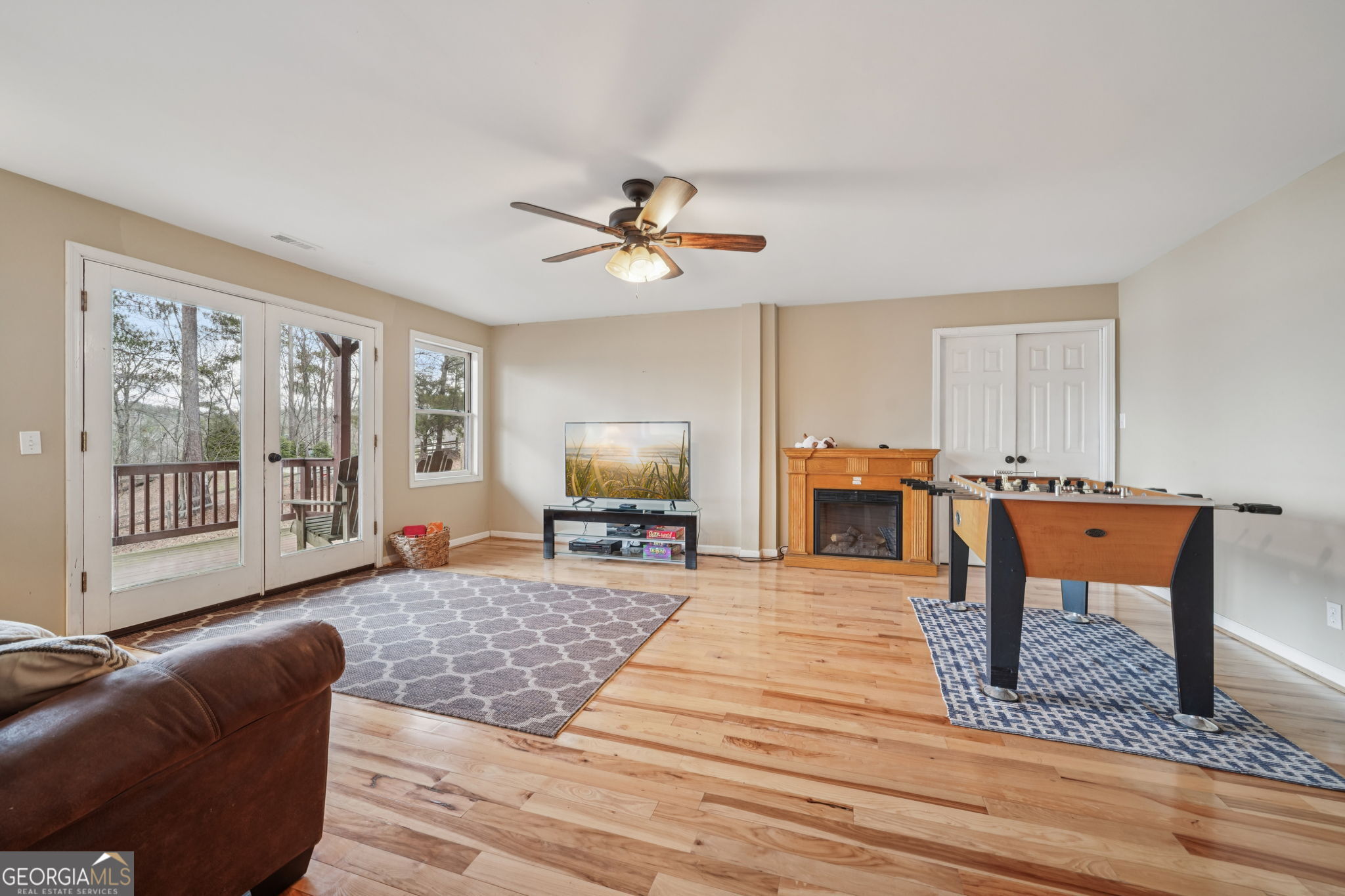 50 Eubanks Point Road Wedowee, AL 36278 - Photo 26 of 81 a living room with furniture a fireplace and a flat screen tv
