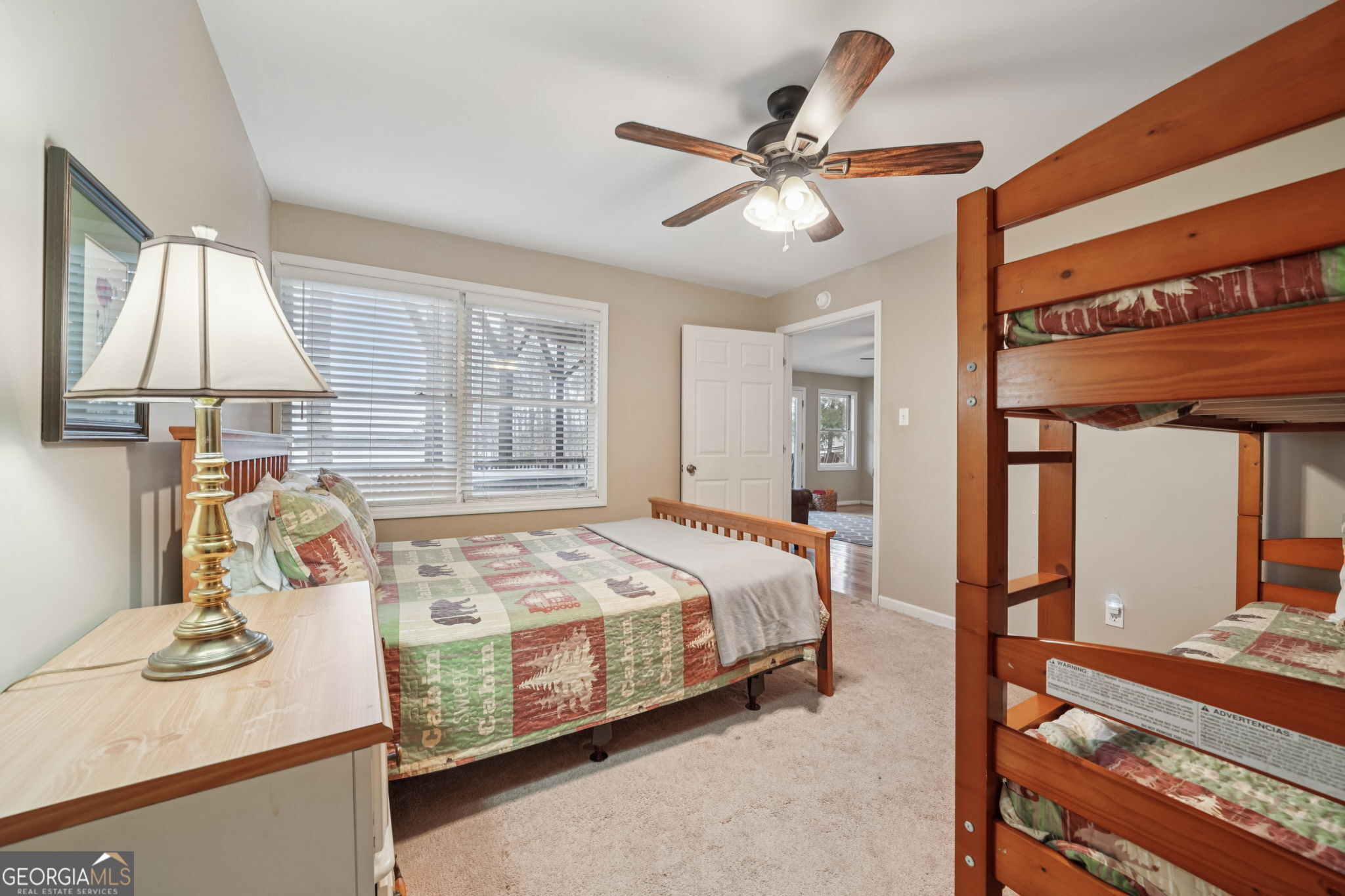50 Eubanks Point Road Wedowee, AL 36278 - Photo 31 of 81 a bedroom with a bed and dresser with mirror