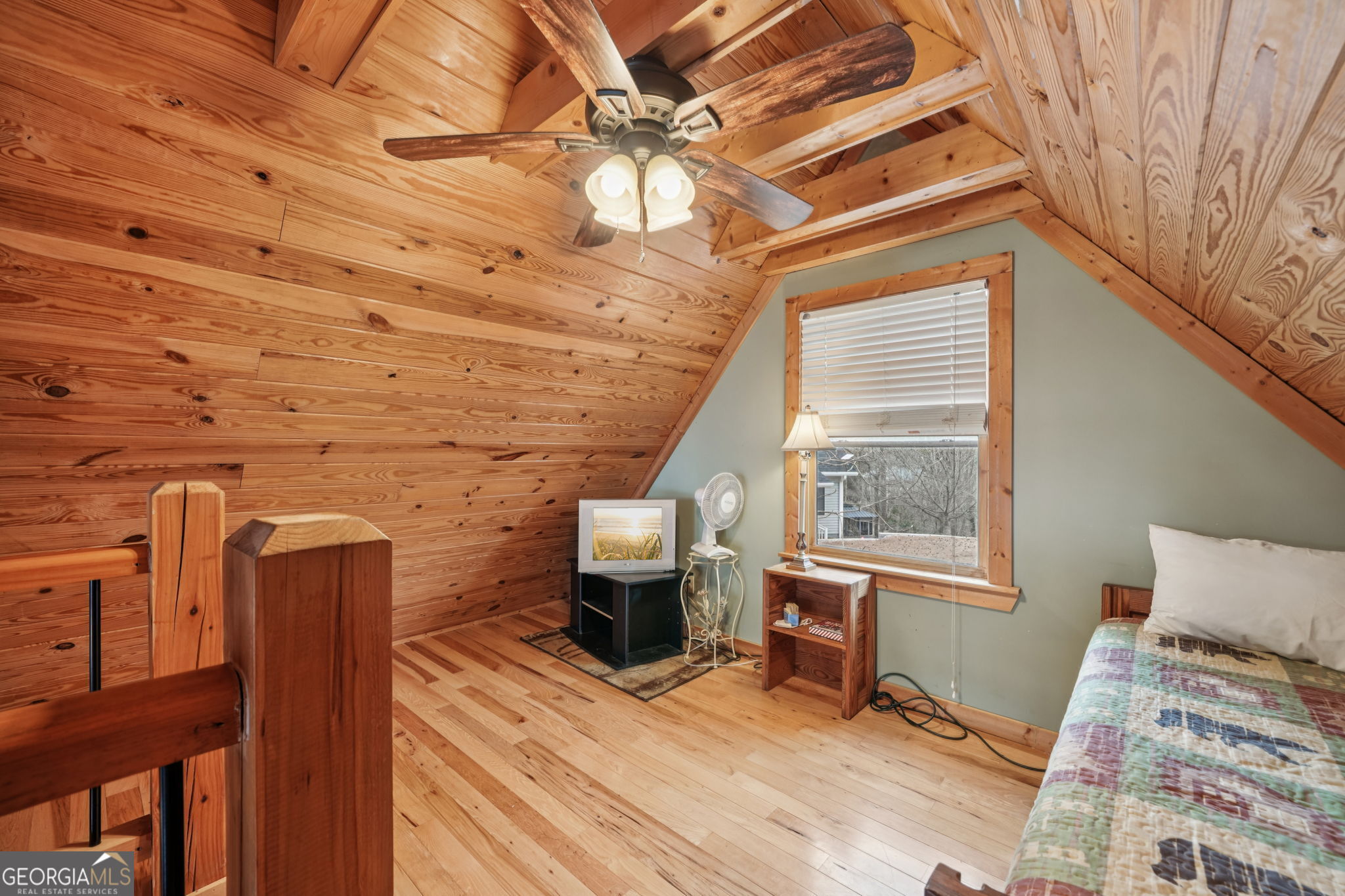 50 Eubanks Point Road Wedowee, AL 36278 - Photo 34 of 81 a view of a bedroom with a window and wooden floor