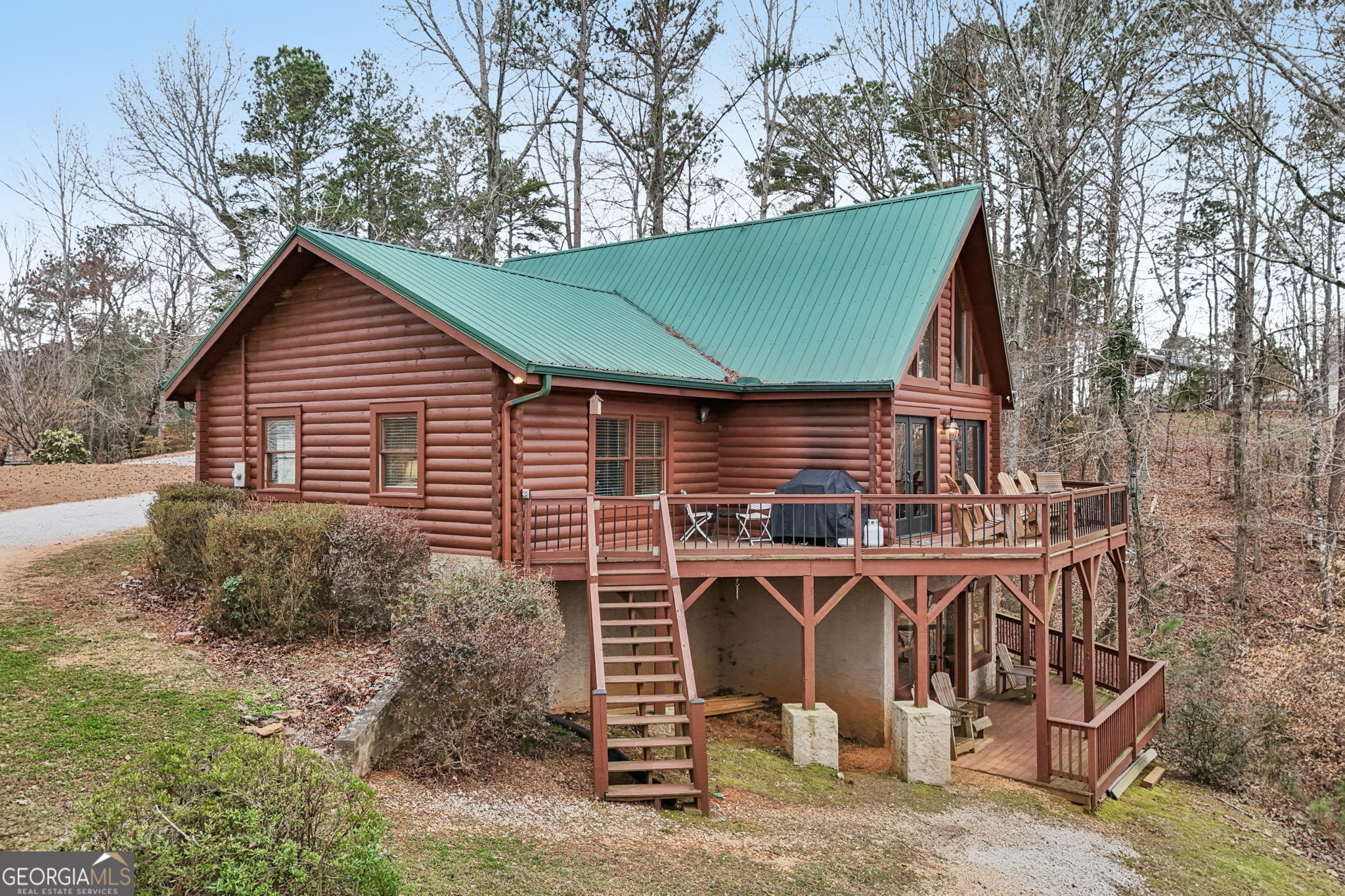 50 Eubanks Point Road Wedowee, AL 36278 - Photo 4 of 81 a backyard of a house with table and chairs