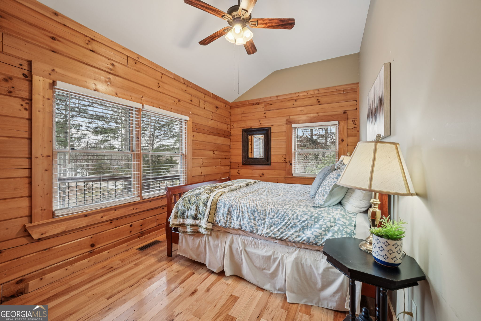 50 Eubanks Point Road Wedowee, AL 36278 - Photo 41 of 81 a bed sitting in a bedroom next to a window