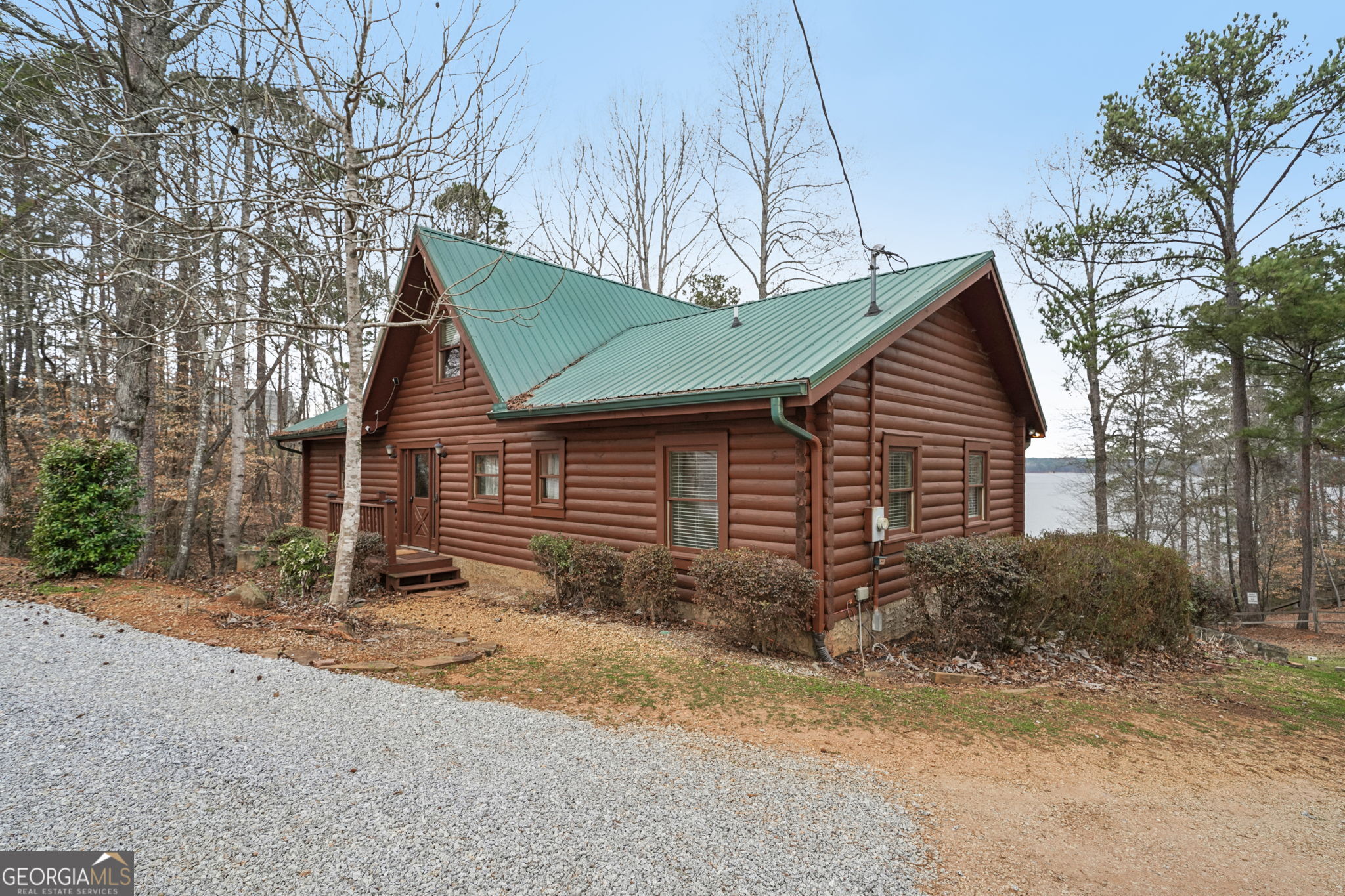 50 Eubanks Point Road Wedowee, AL 36278 - Photo 6 of 81 a view of a house that has a small yard next to a road