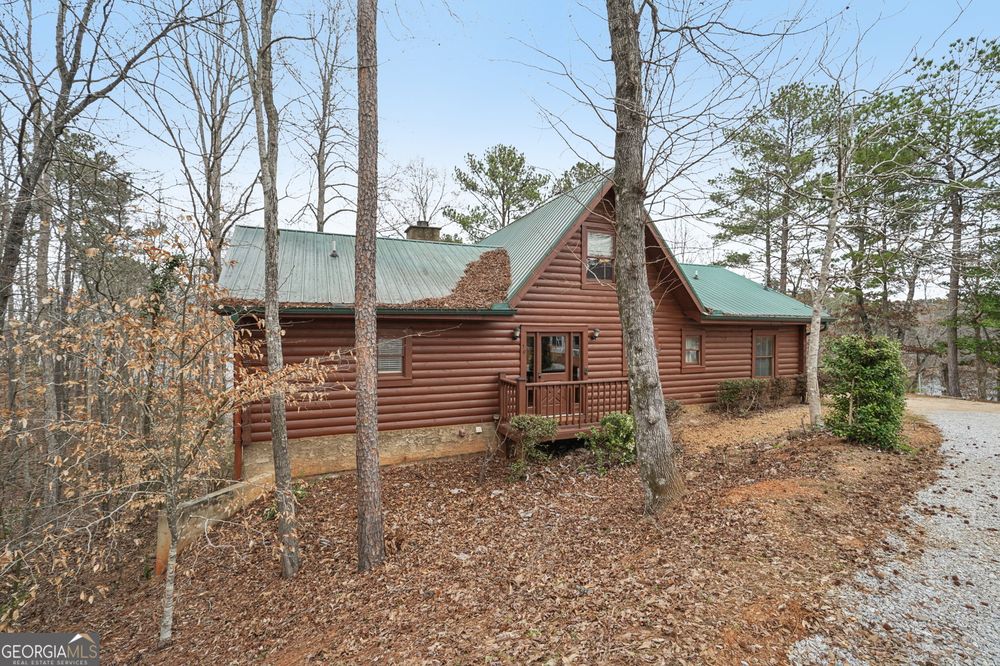 50 Eubanks Point Road Wedowee, AL 36278 - Photo 9 of 81 a view of a house with a yard and wooden fence