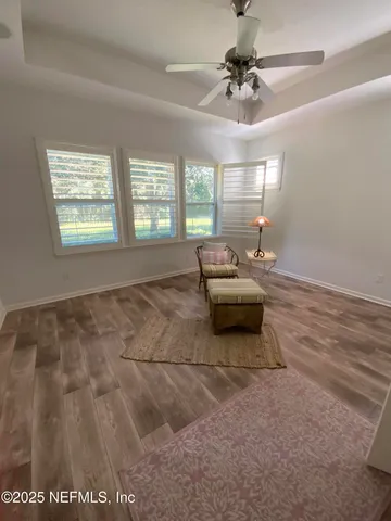 a living room with furniture and window