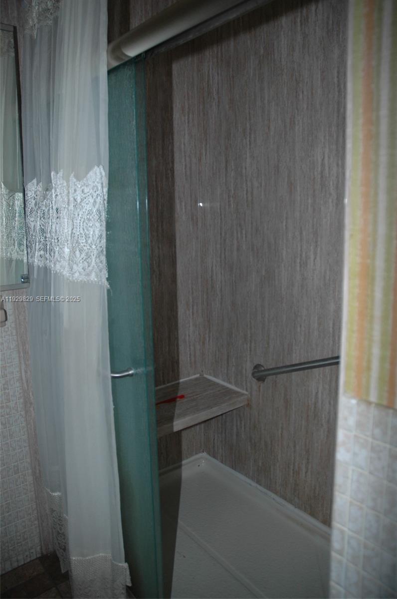 5300 Washington Street, Unit F119 Hollywood, FL 33021 - Photo 18 of 24 a view of walk in closet