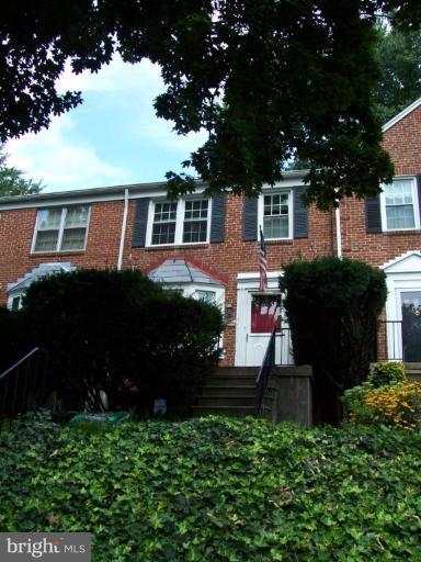 156 Dumbarton Road Baltimore, MD 21212 - Photo 1 of 14 a house view with a garden space