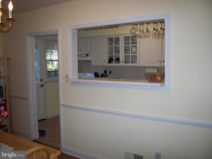 156 Dumbarton Road Baltimore, MD 21212 - Photo 4 of 14 a bathroom with a sink and a mirror