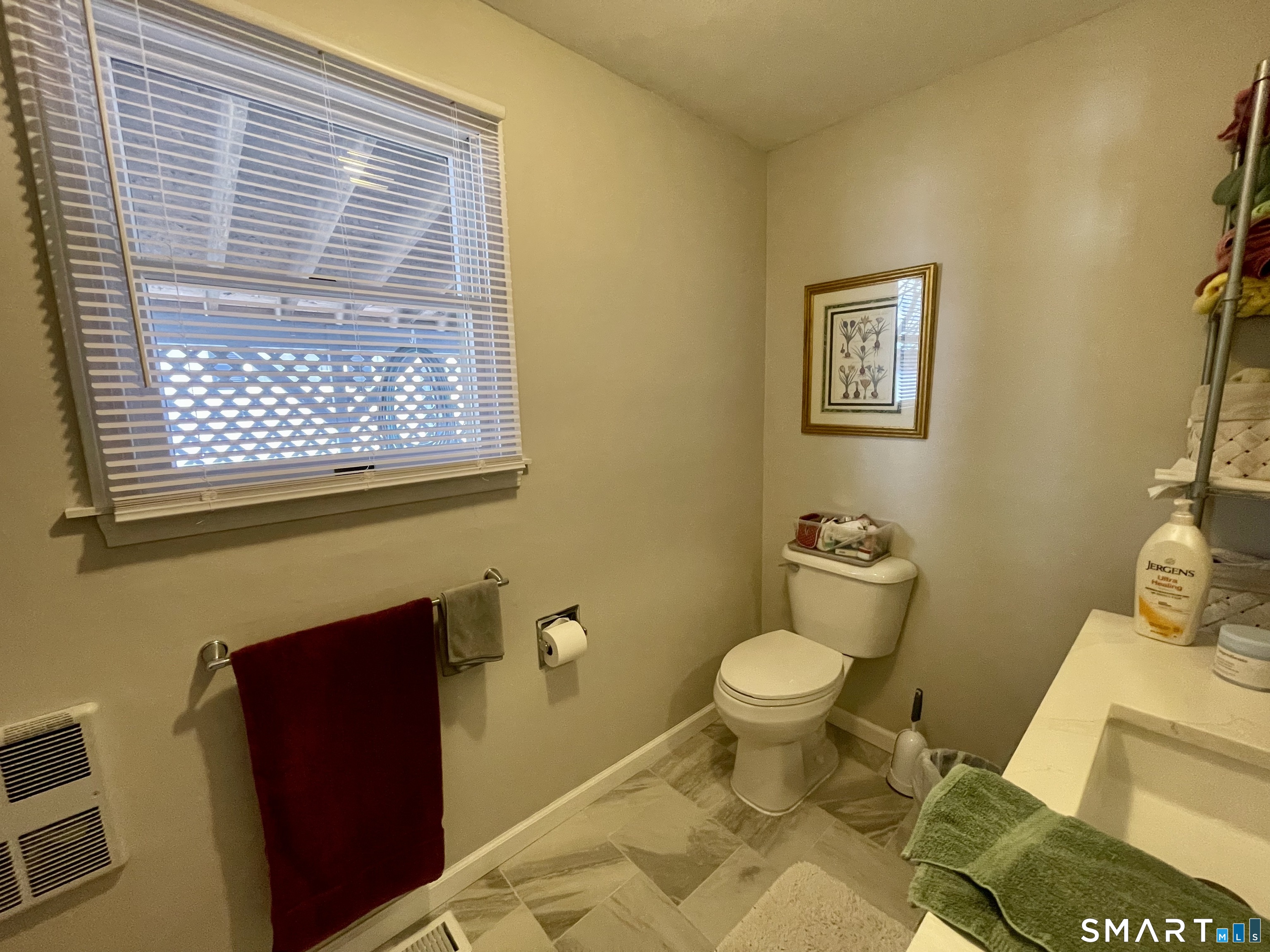 203 Pine Hollow Road Killingly, CT 06241 - Photo 6 of 14 a bathroom with a toilet and a sink
