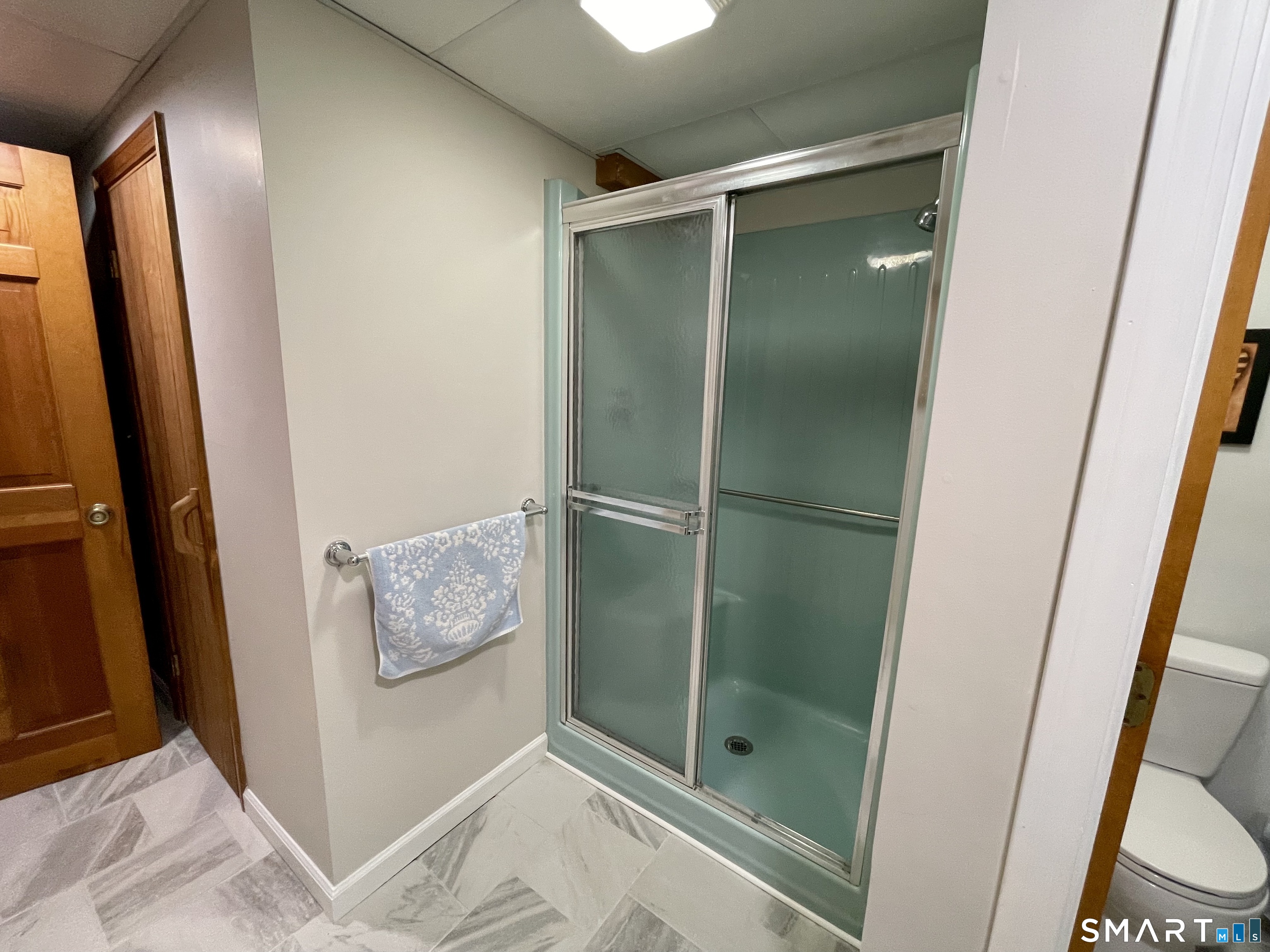 203 Pine Hollow Road Killingly, CT 06241 - Photo 8 of 14 a bathroom with a shower and a mirror