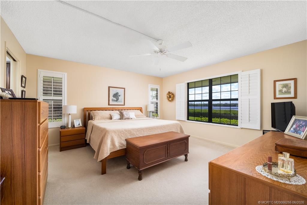 3100 Southeast Pruitt Road, Unit F101 Port St. Lucie, FL 34952 - Photo 19 of 37 Impact windows with plantation shutters