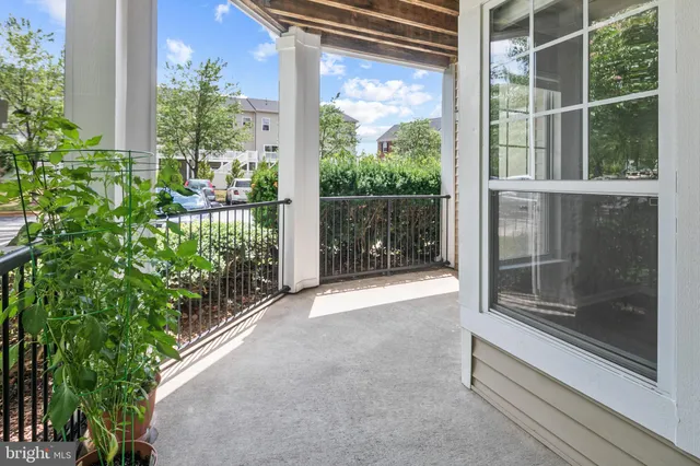 a view of a glass door with a yard