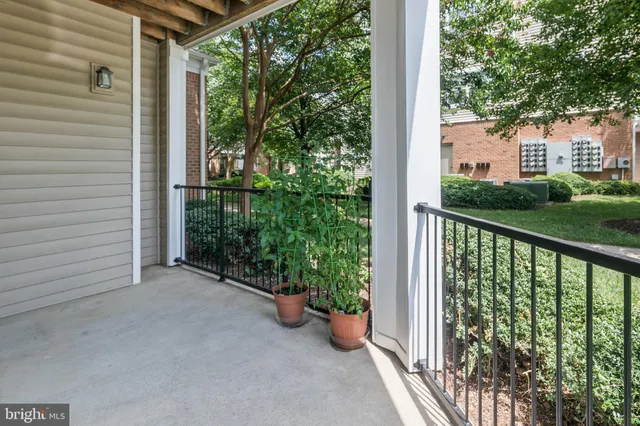 a view of a porch with garden
