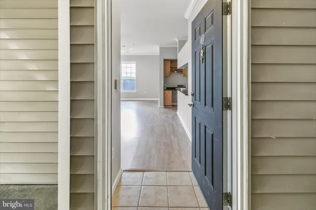 a view of a room that has a door in front of it