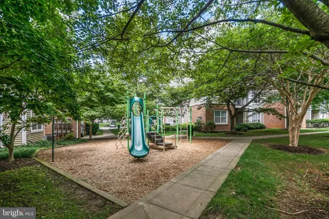 a tree in the garden of a house