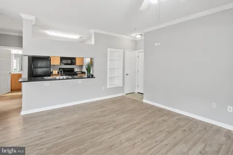 a view of a kitchen with a sink and a microwave