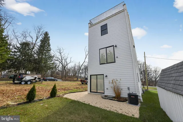 a view of a backyard with couches