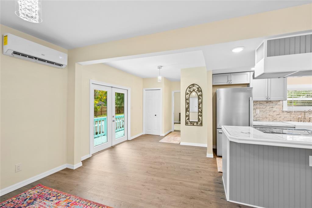 245 South Rhodes Street Mount Dora, FL 32757 - Photo 14 of 38 a view of kitchen with stainless steel appliances granite countertop a refrigerator and a sink