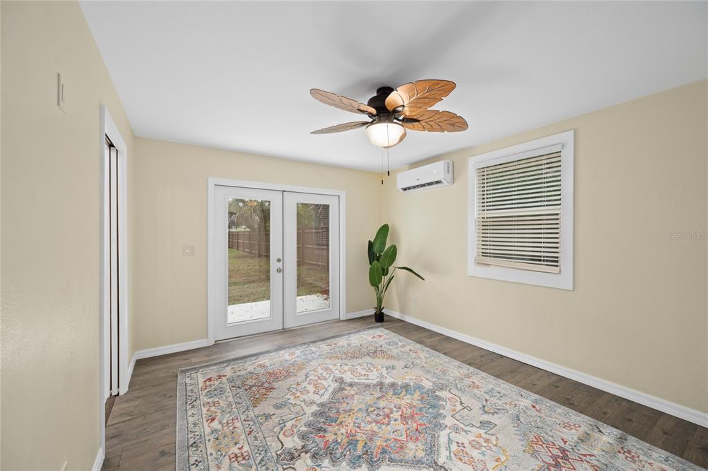 245 South Rhodes Street Mount Dora, FL 32757 - Photo 18 of 38 a view of an empty room and window